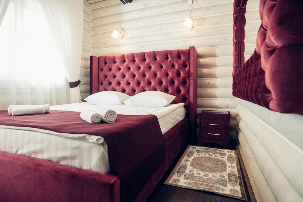 Ліжко або ліжка в номері Podsolnukh Farm Stay