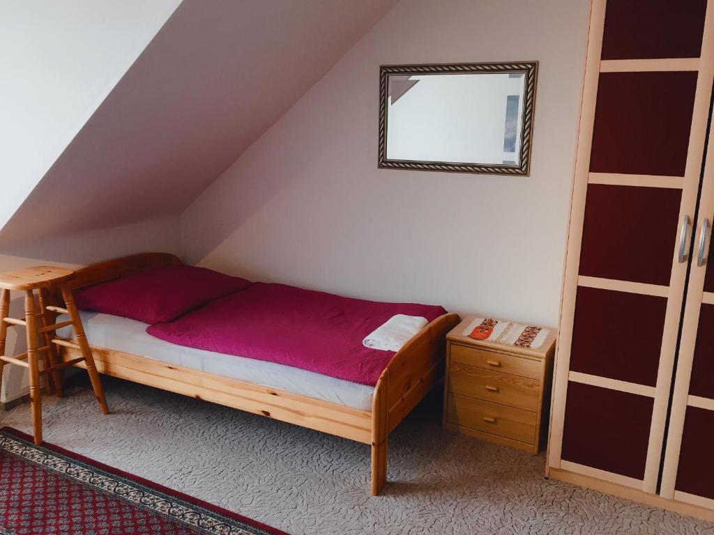 Postel nebo postele na pokoji v ubytování Eifelhof Weina