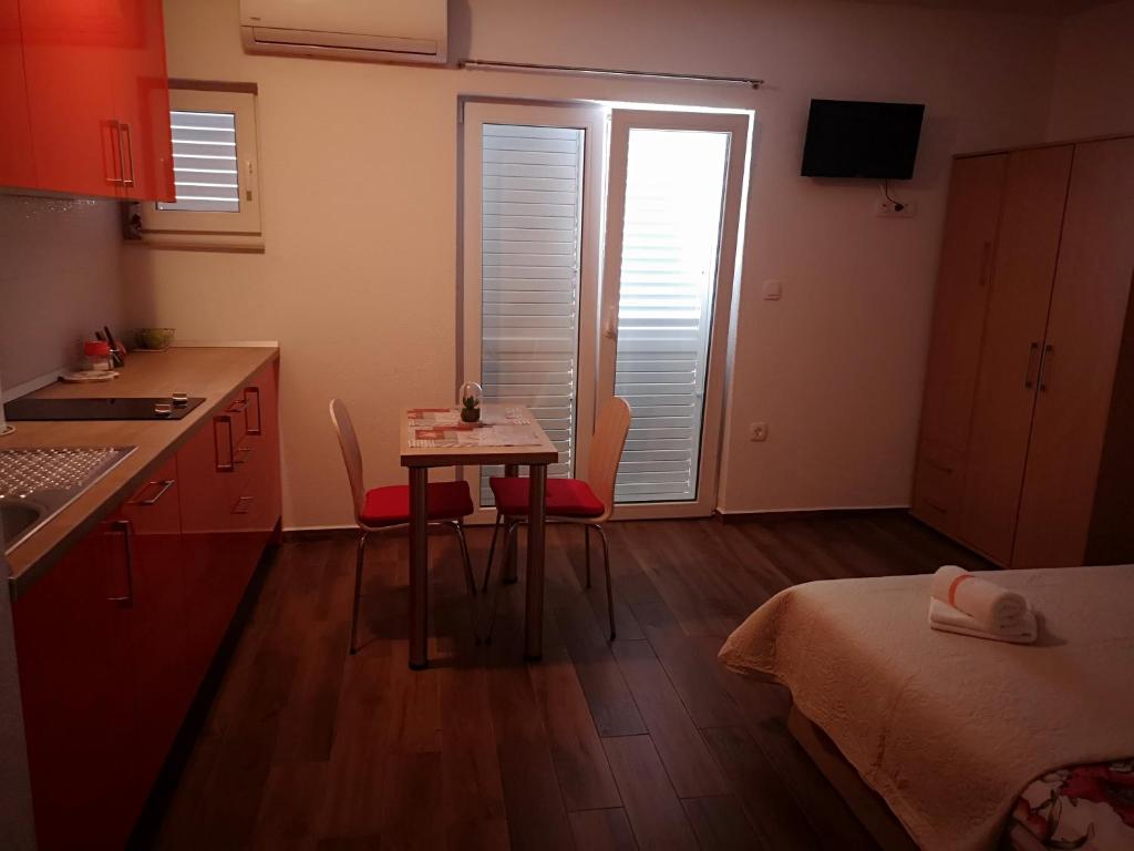 Postel nebo postele na pokoji v ubytování Apartmani Sea