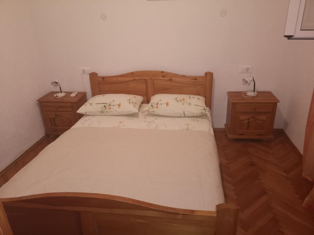 Postel nebo postele na pokoji v ubytování Apartmani Sea