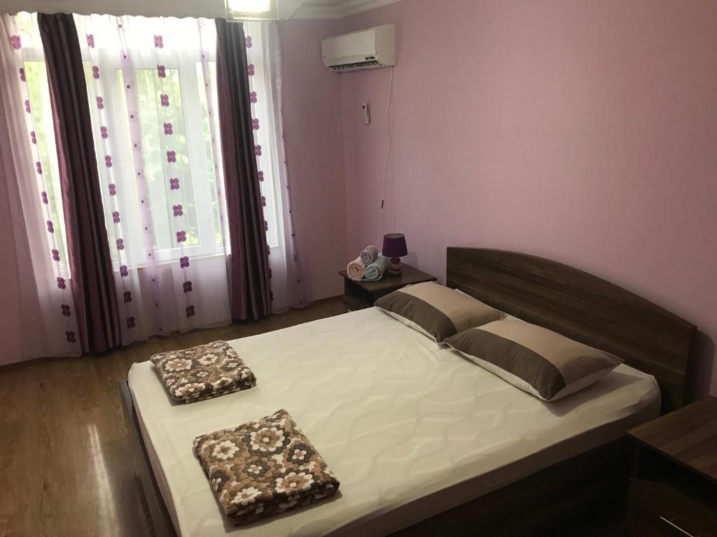 Postel nebo postele na pokoji v ubytování Mari Guest House