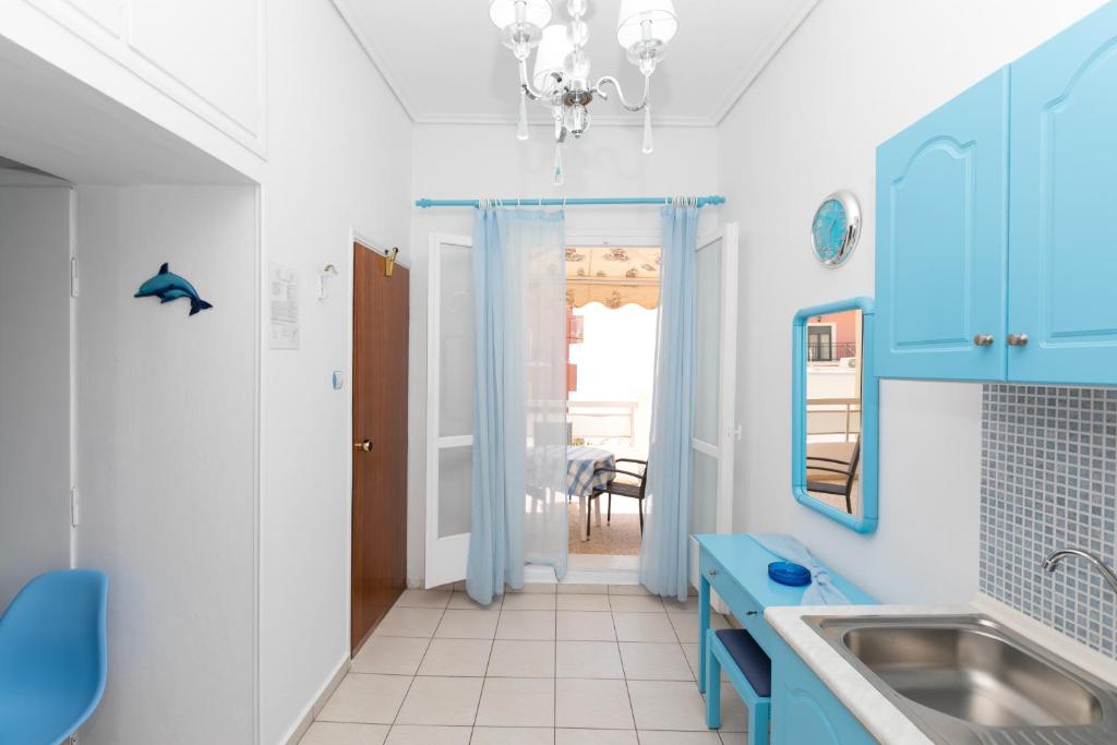 A kitchen or kitchenette at Kallithea Studios