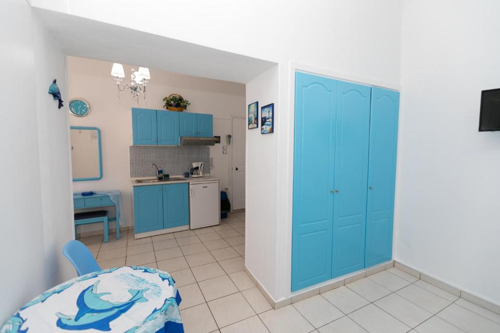 A kitchen or kitchenette at Kallithea Studios