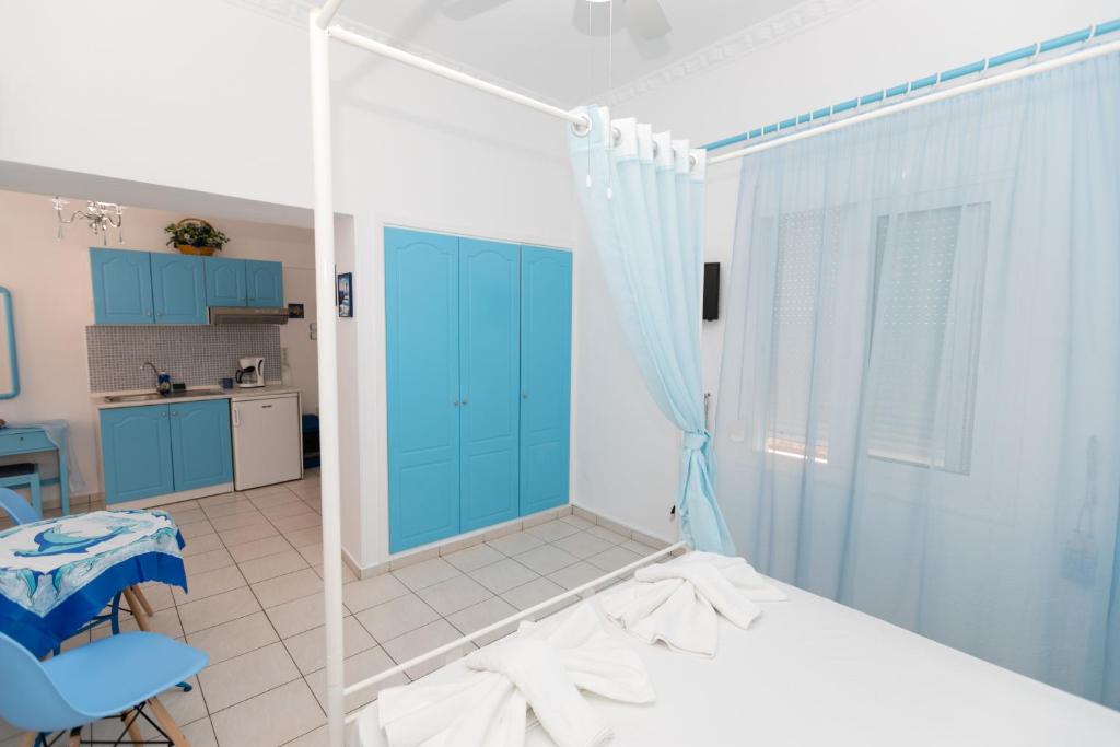A bed or beds in a room at Kallithea Studios