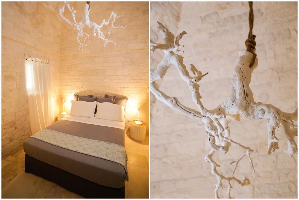 Postel nebo postele na pokoji v ubytování Hermanas Relais - trulli luxury