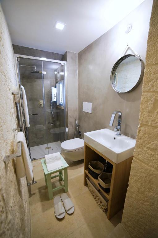 Koupelna v ubytování Hermanas Relais - trulli luxury