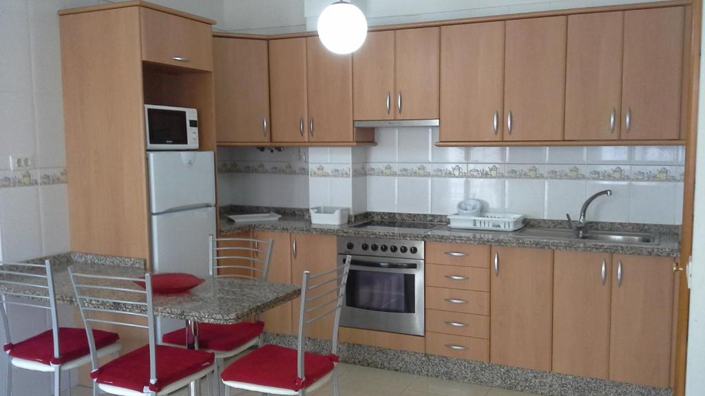 Kuchyň nebo kuchyňský kout v ubytování Sol de Tenerife