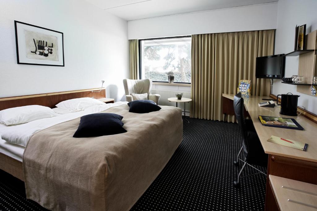 Una cama o camas en una habitación de Hotel Legoland