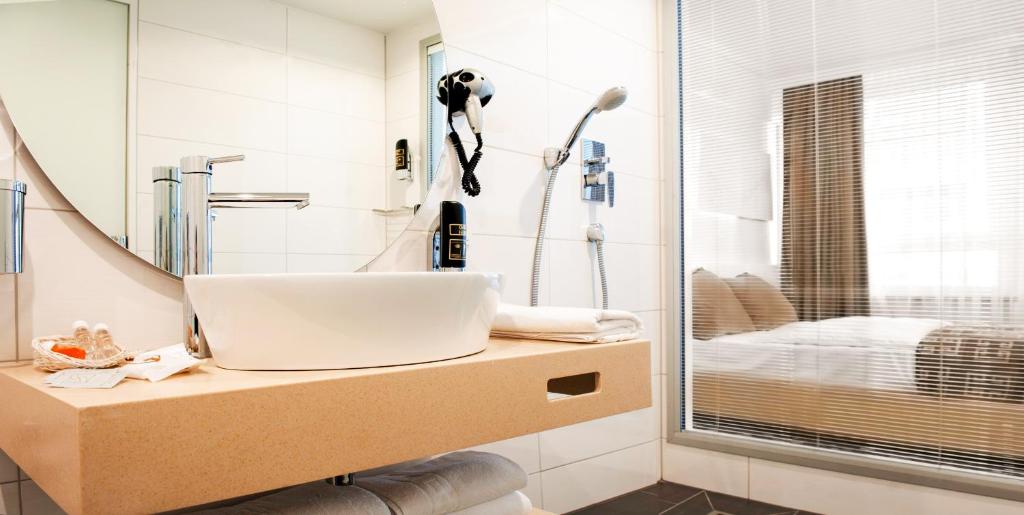 Postel nebo postele na pokoji v ubytování Hotel Bayer's