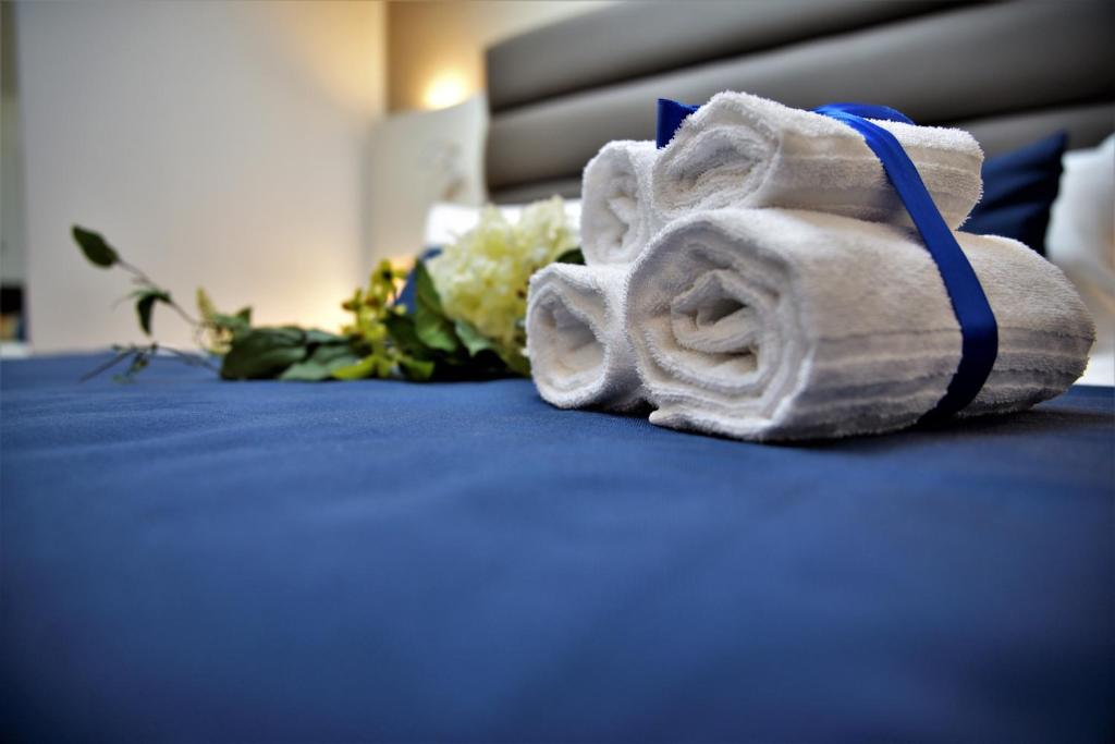 Postel nebo postele na pokoji v ubytování Palazzo Sisto Exclusive Rooms