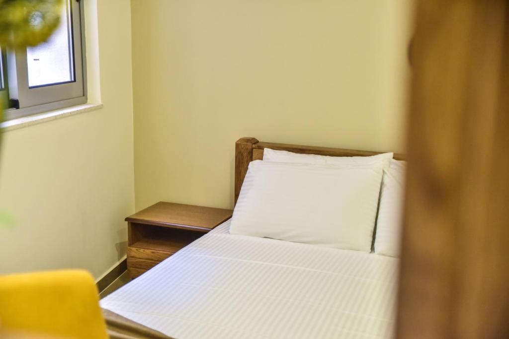 Postel nebo postele na pokoji v ubytování Hotel Prova