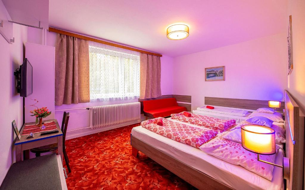 Postel nebo postele na pokoji v ubytování Guesthouse Cyprian