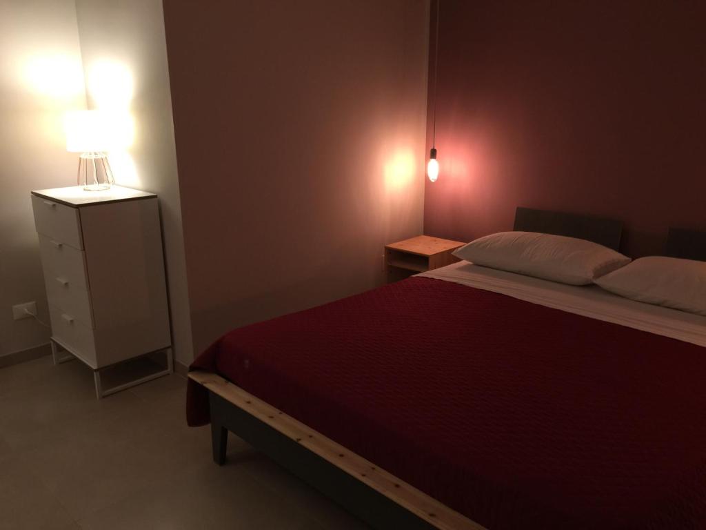 Łóżko lub łóżka w pokoju w obiekcie Apartment Antonella