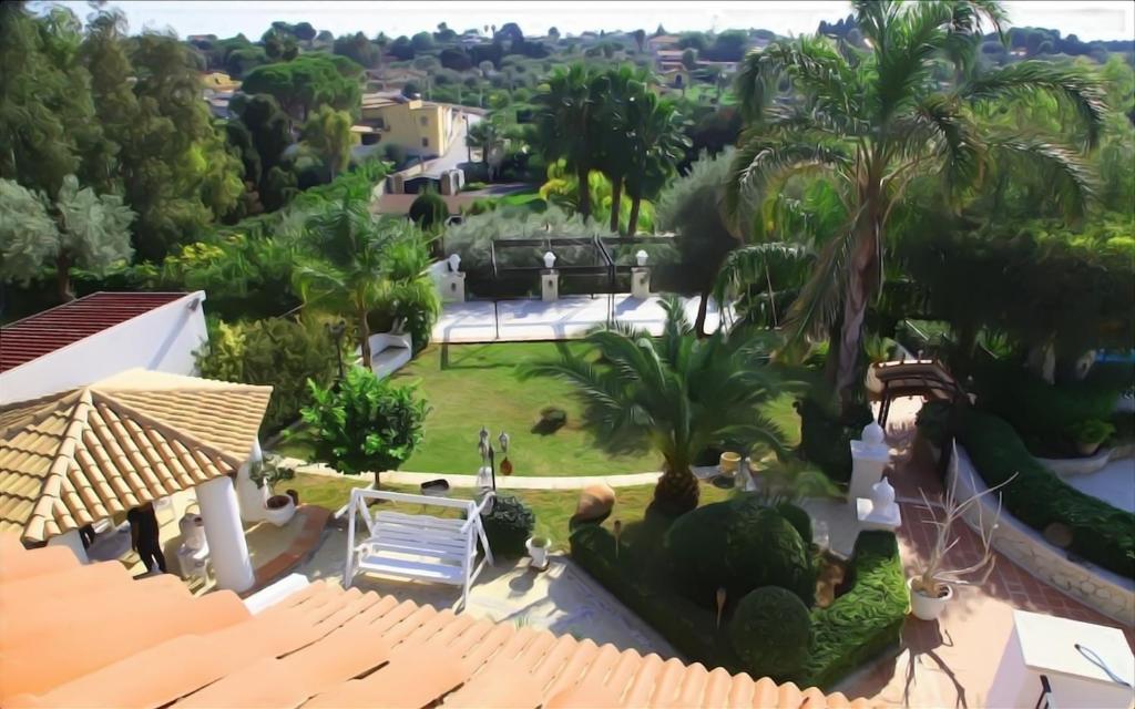 an aerial view of a house with a garden at Villa Gaia - Elegant Holiday Home in a sun and sea setting in Avola