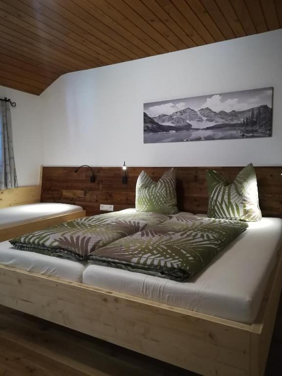 Postel nebo postele na pokoji v ubytování Altböckhof