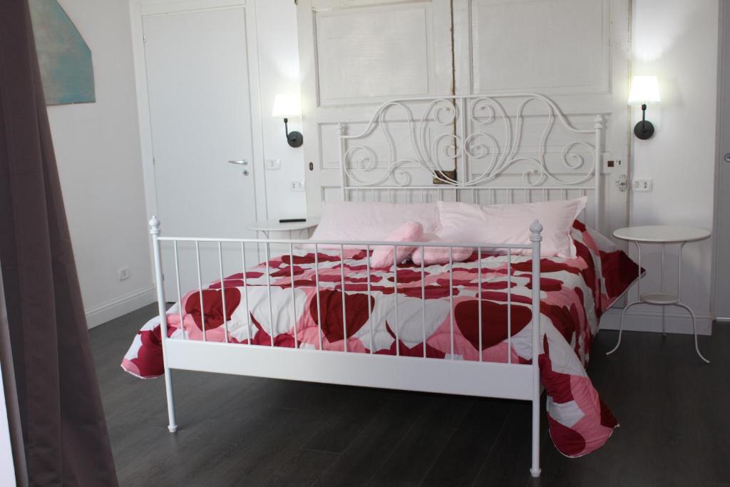 Posteľ alebo postele v izbe v ubytovaní Angels'Home Raffaello
