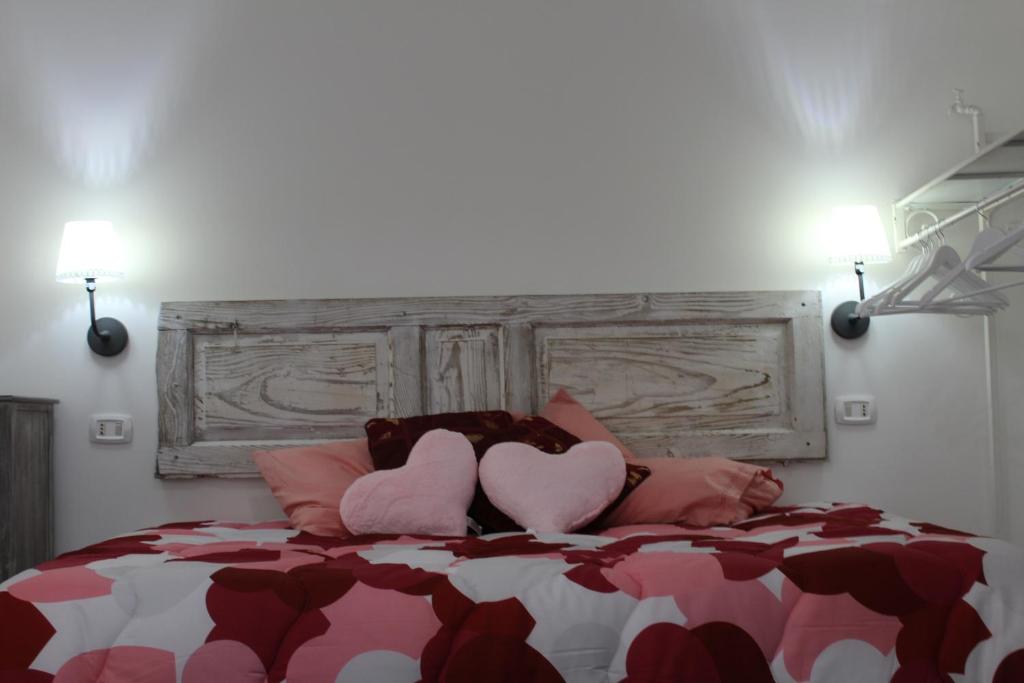 Posteľ alebo postele v izbe v ubytovaní Angels'Home Raffaello
