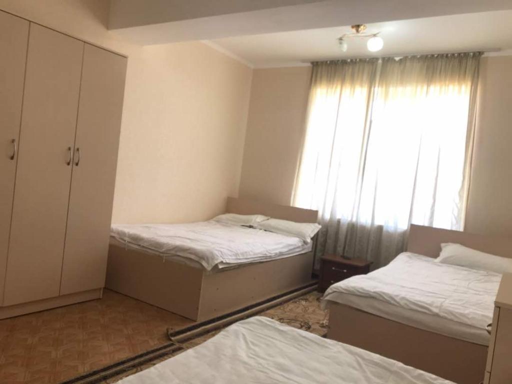 Postel nebo postele na pokoji v ubytování Taberik