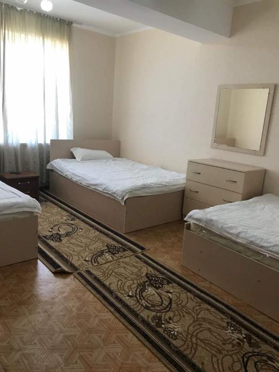 Postel nebo postele na pokoji v ubytování Taberik