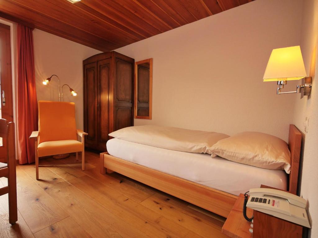 Postel nebo postele na pokoji v ubytování Hotel Alpenblick