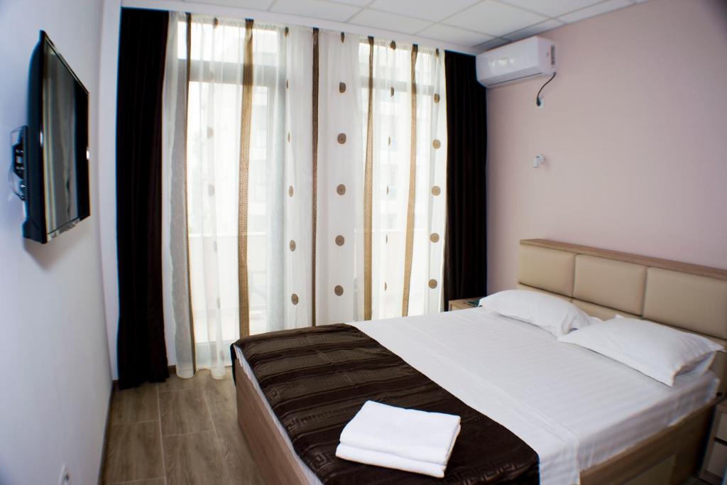 Postel nebo postele na pokoji v ubytování Hotel Solea Beach
