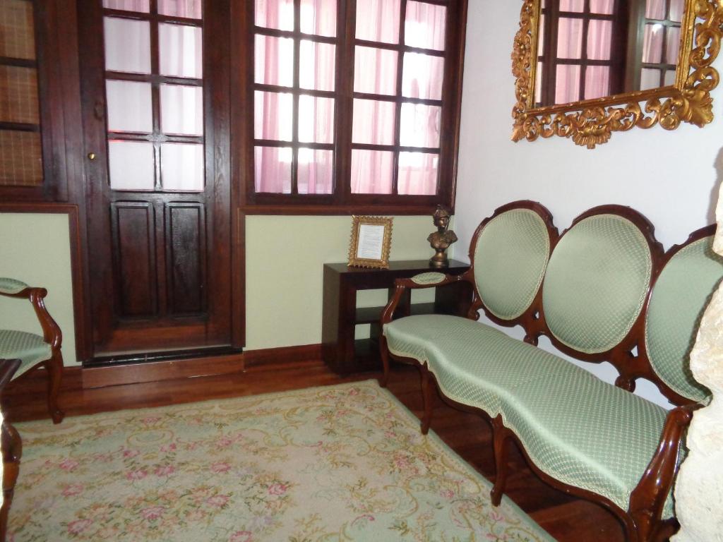 Posezení v ubytování Hotel Boutique Nueve Leyendas