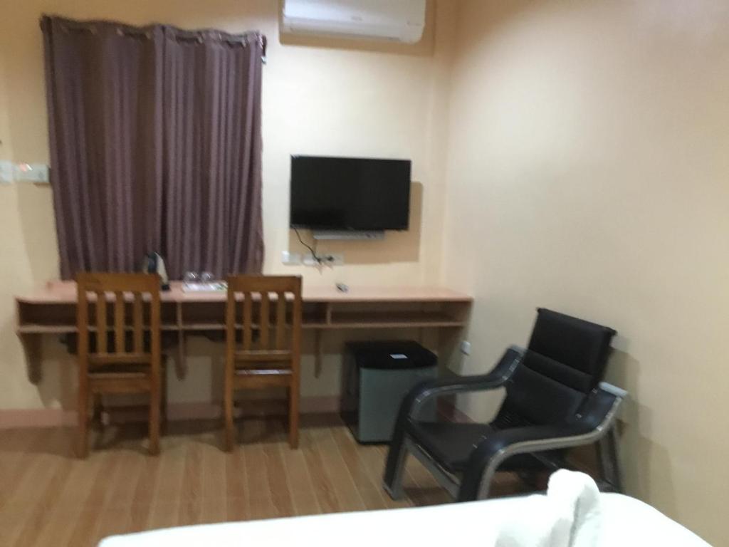 TV a/nebo společenská místnost v ubytování Dayview Tourist Home