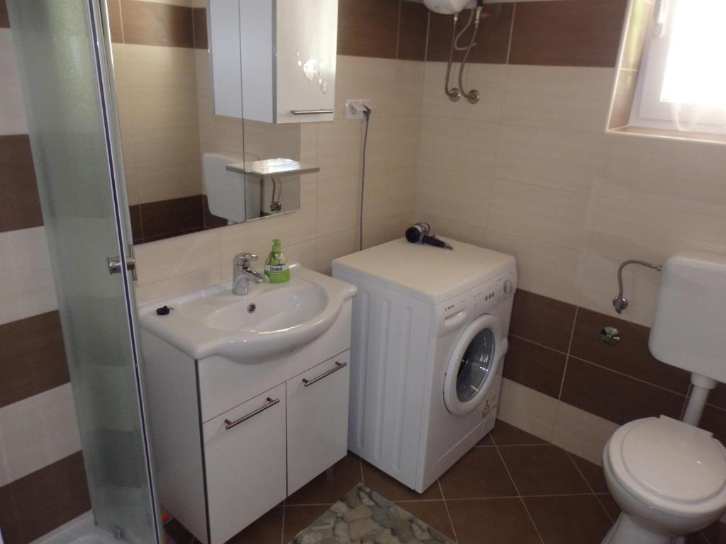 Koupelna v ubytování Apartments Rezek