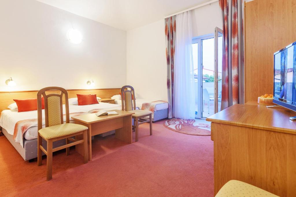 Postel nebo postele na pokoji v ubytování Villa Vicko