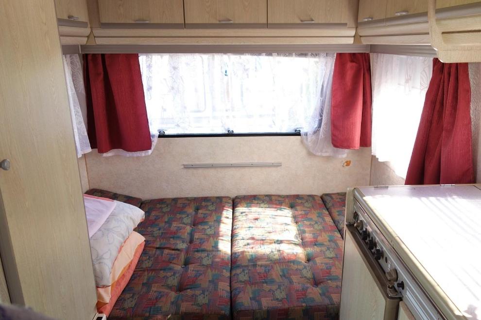 Postel nebo postele na pokoji v ubytování Camping Pod Żaglem