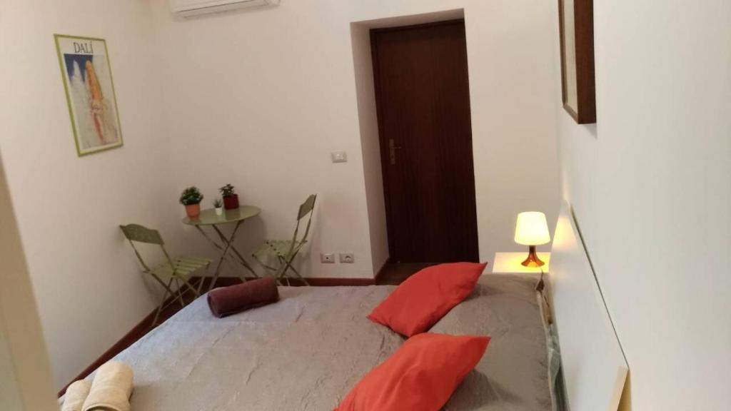 Posteľ alebo postele v izbe v ubytovaní A casa di Lori