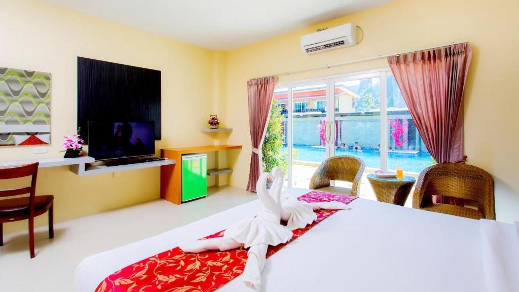 Postel nebo postele na pokoji v ubytování Phi Phi Maiyada Resort