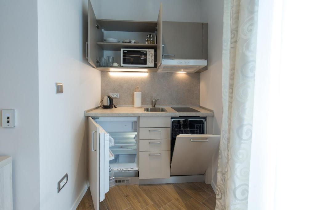 Kuchyňa alebo kuchynka v ubytovaní AML apartments