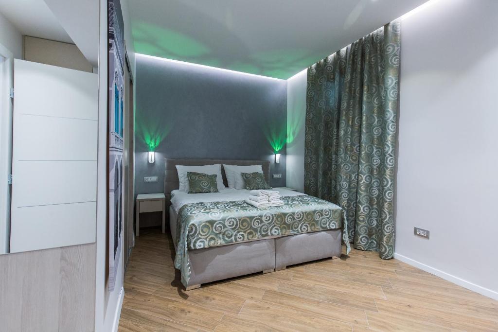 Posteľ alebo postele v izbe v ubytovaní AML apartments