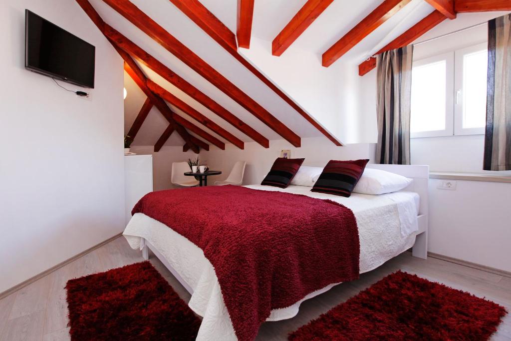 Postel nebo postele na pokoji v ubytování Luxory D-Rooms