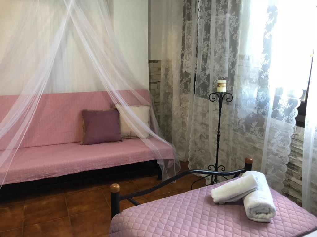 Postel nebo postele na pokoji v ubytování Tessera