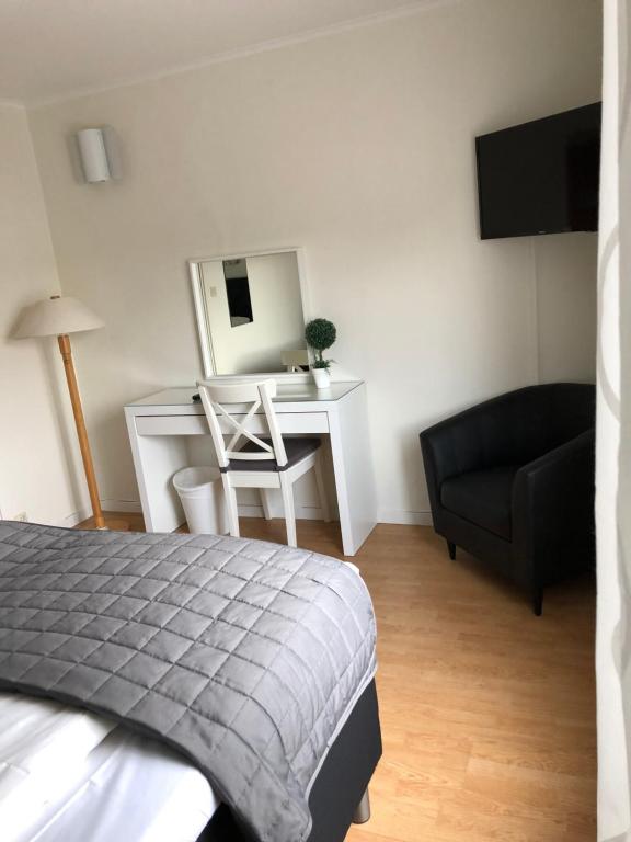 Postel nebo postele na pokoji v ubytování Hotell Björnidet