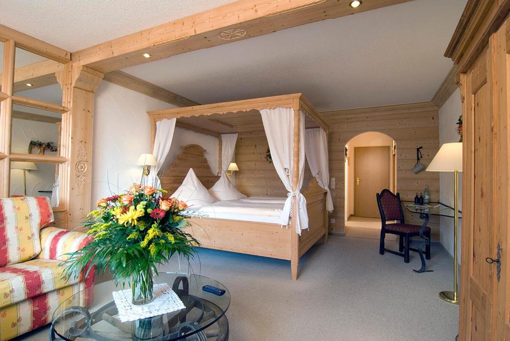 Postel nebo postele na pokoji v ubytování Naturhotel Rebling