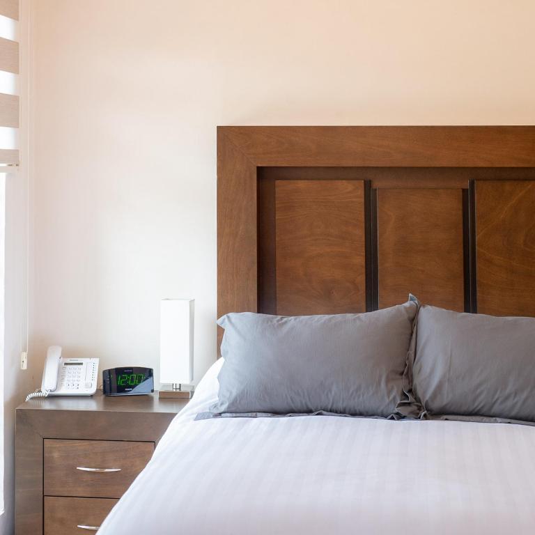 Postel nebo postele na pokoji v ubytování Hotel Posada XR