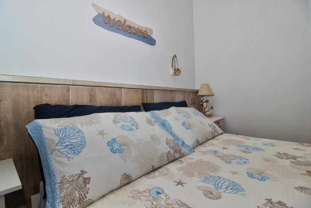 Postel nebo postele na pokoji v ubytování B&B Sea and Garden