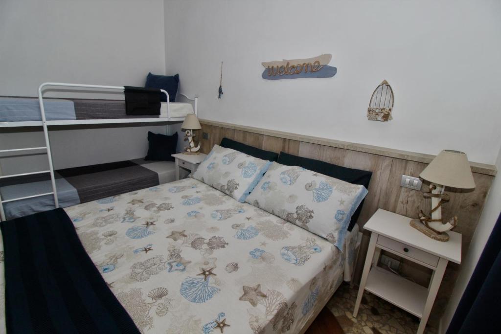 Postel nebo postele na pokoji v ubytování B&B Sea and Garden