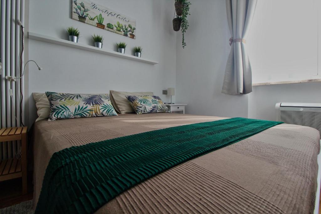 Postel nebo postele na pokoji v ubytování B&B Sea and Garden