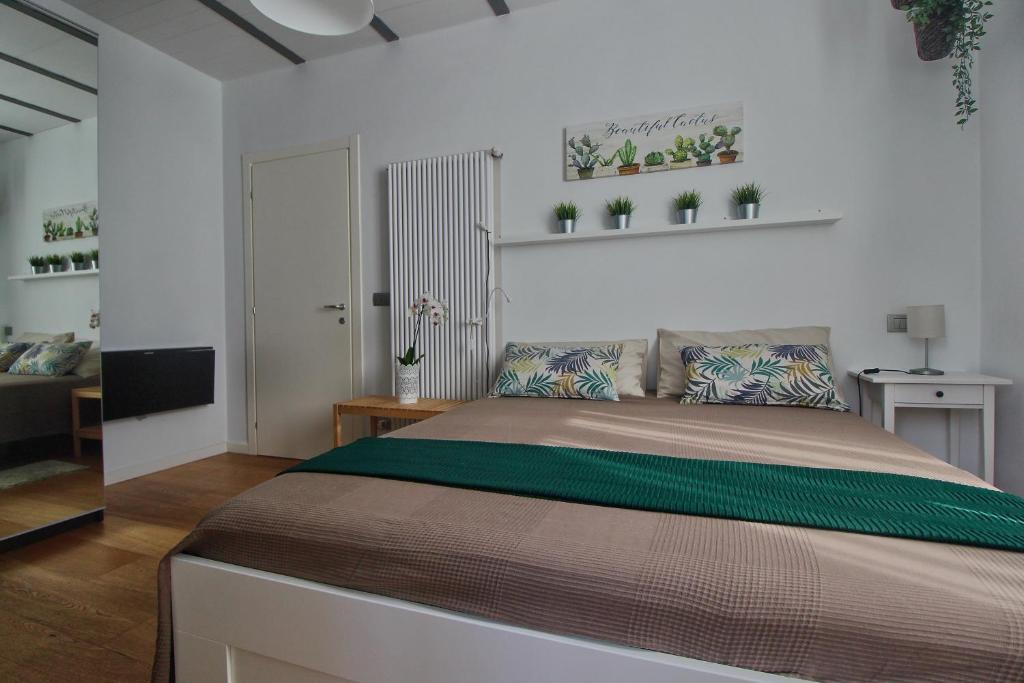 Postel nebo postele na pokoji v ubytování B&B Sea and Garden