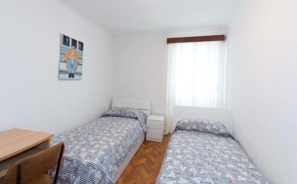 Postel nebo postele na pokoji v ubytování Sobe pri Anici