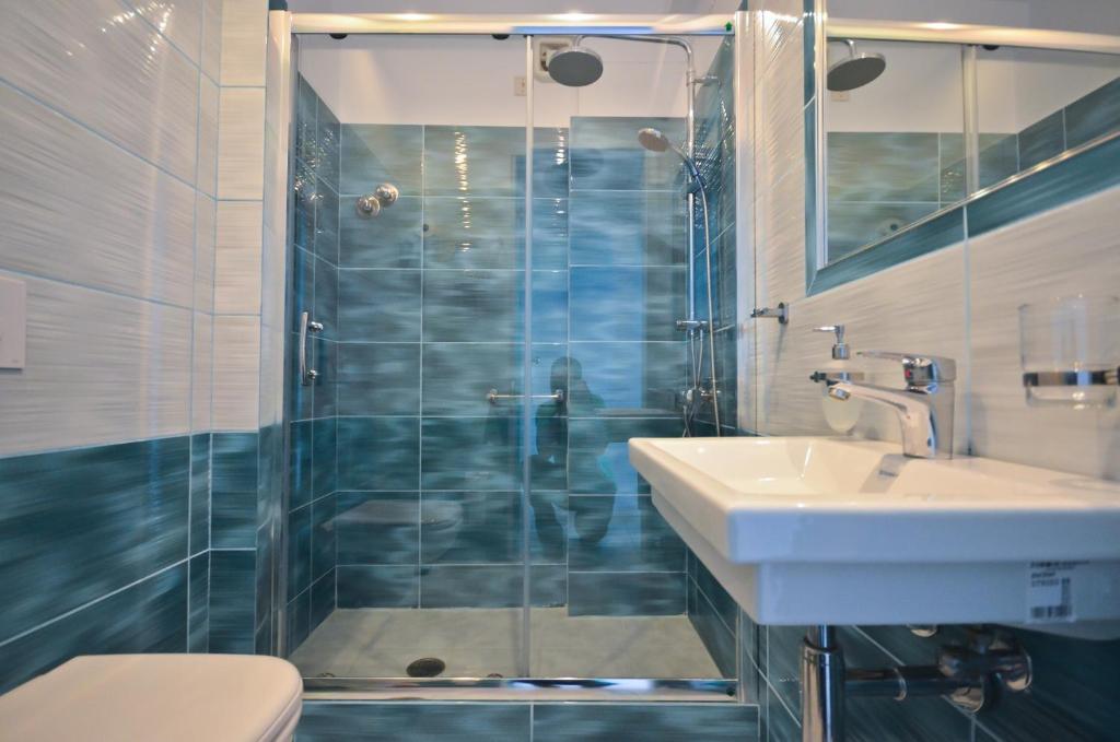 Koupelna v ubytování Anatoli Hotel