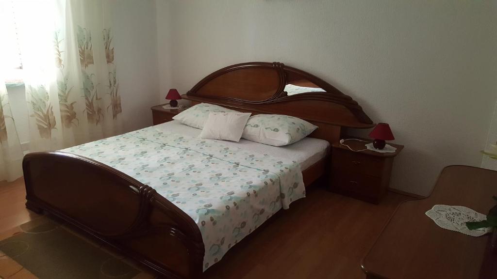 Postel nebo postele na pokoji v ubytování Apartment Jelić