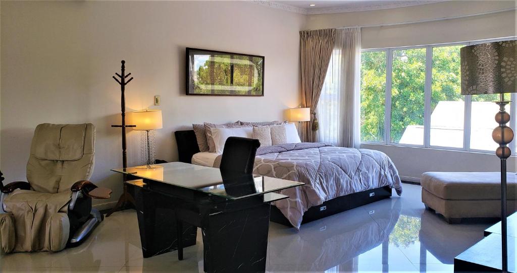 Posezení v ubytování Alameda Cariari Boutique Hotel