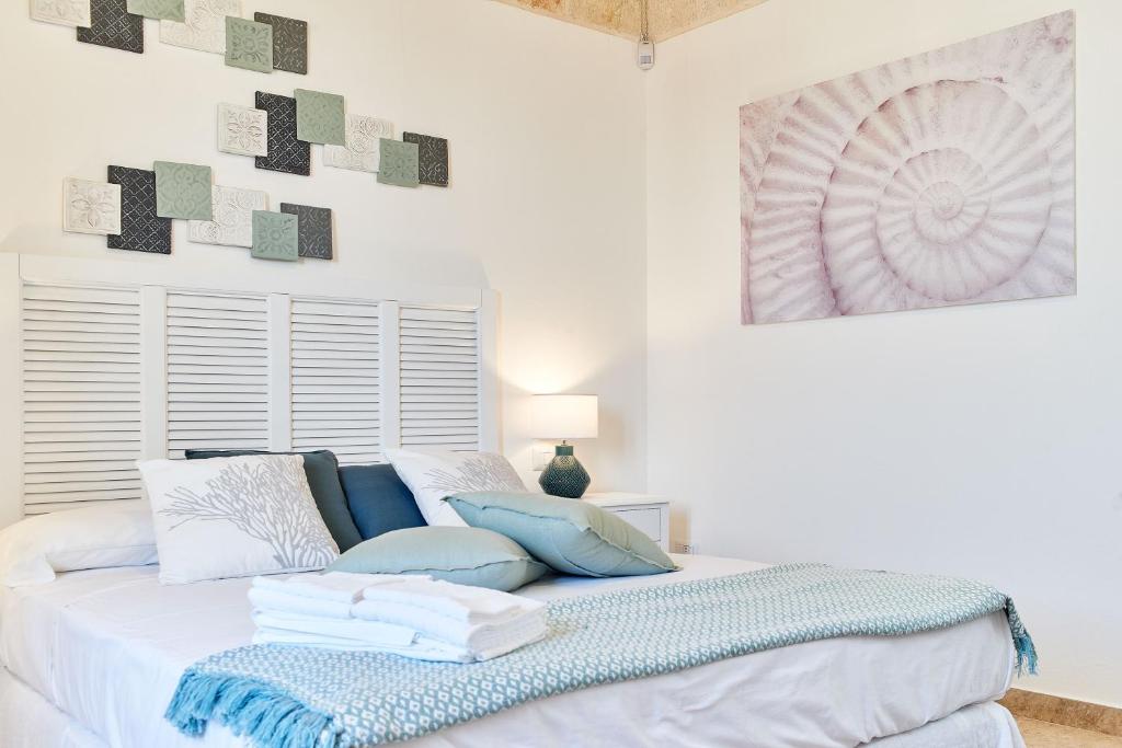 Postel nebo postele na pokoji v ubytování POSEA - Polignano Sea Suites