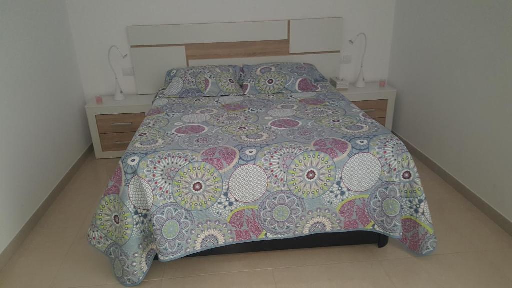 Postel nebo postele na pokoji v ubytování Apartamento Juli4