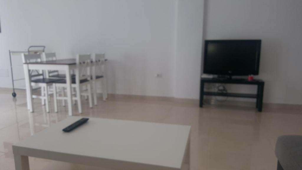 TV a/nebo společenská místnost v ubytování Apartamento Juli4